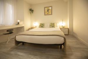 Cama ou camas em um quarto em Alojamientos Cantíber