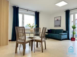 Posedenie v ubytovaní Bałtyk Apartment- Tranquil Retreat, 15 Minutes to the Sea & Gdańsk City Center