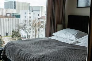 Posteľ alebo postele v izbe v ubytovaní RS SUITES PRESTIGE Racławickie 10 HOME & SPA