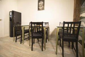 Uma área de estar em Alojamientos Cantíber