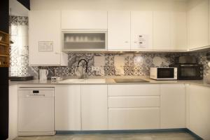 A cozinha ou cozinha compacta de Alojamientos Cantíber