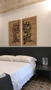 Postel nebo postele na pokoji v ubytování Casa del Moro