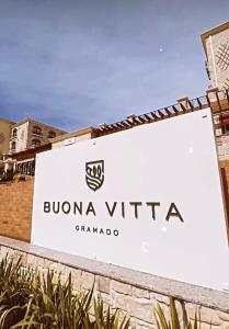a sign for the bulonia vita grandano at Buona Vitta Resort & Spa in Gramado