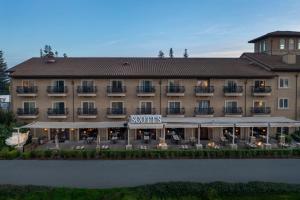 a rendering of the windsor hotel from the river at The Westin Sacramento Hotel & Marina in Sacramento