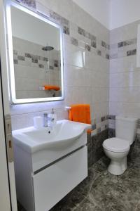 Koupelna v ubytování Davide Rooms