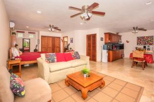 a living room with a couch and a table at Lawson Rock - Yellowfish 110 Condo in Sandy Bay