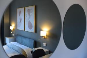 Ένα ή περισσότερα κρεβάτια σε δωμάτιο στο Vasilios Marinos Rooms 