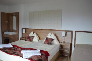 Letto o letti in una camera di Jägerhotel