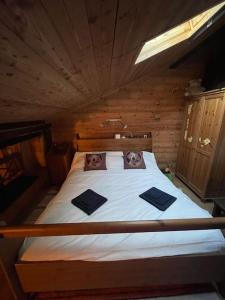 Una cama o camas en una habitación de Masetto Savelle - Vivere come in una fiaba