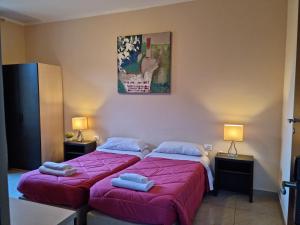Cama o camas de una habitación en Hostel Mosaic