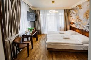 Posteľ alebo postele v izbe v ubytovaní Villa Neve