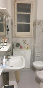 Koupelna v ubytování Casa vacanze Cagliari + 28 fotografií