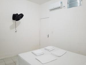a white room with a white table and a lamp at Casa Brisa in Fortaleza +136 photos