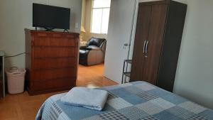 Postel nebo postele na pokoji v ubytování Hospedaje Kelita + 5 fotografií