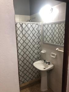 Ένα μπάνιο στο Alojamiento Temporario “LG”