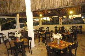 Een restaurant of ander eetgelegenheid bij VOA Mirante Do Café