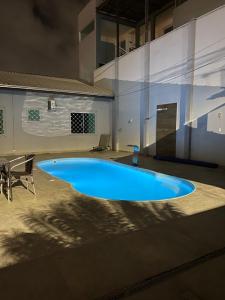 Bazén v ubytování Casa no centro de Balneário Camboriú nebo v jeho okolí