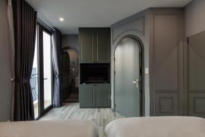 Cama o camas de una habitación en Mercury Beach DaNang