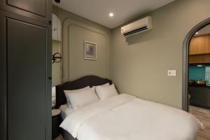 Cama o camas de una habitación en Mercury Beach DaNang