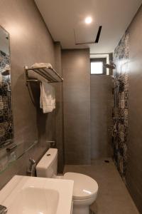 Un baño de Mercury Beach DaNang