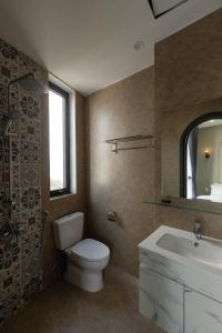 Un baño de Mercury Beach DaNang