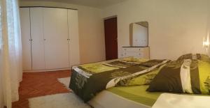 Cama o camas de una habitación en Apartment Mirjana