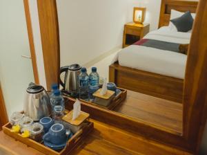 Postel nebo postele na pokoji v ubytování Pandu guest house