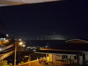 a view of a city at night at Seaview Hideaway in Port-of-Spain