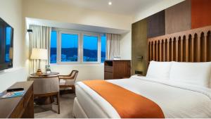 Letto o letti in una camera di Al Falaj Hotel