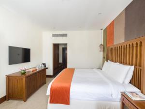 Letto o letti in una camera di Al Falaj Hotel