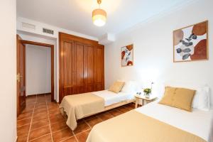 Кровать или кровати в номере Sauna, 3 bedroom apartment by 10ToSea