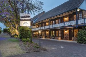a building with a sign in front of it at Montville Mountain Inn in Montville +22 photos