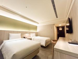 叶绿宿．茶觉旅客房内的一张或多张床位