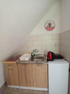 Kuchyňa alebo kuchynka v ubytovaní Guesthouse Loncar + 37 fotografií