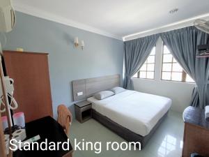 Letto o letti in una camera di Winton Hotel