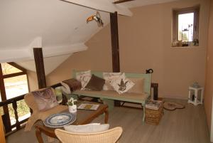 Istumisnurk majutusasutuses Le Clos Arboré (Gîte)