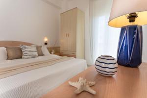 Postel nebo postele na pokoji v ubytování Hotel Teti