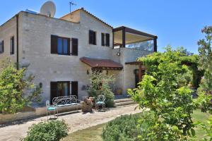 Κήπος έξω από το Villa Harmony, Steinvilla
