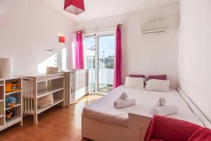Ένα ή περισσότερα κρεβάτια σε δωμάτιο στο Villa Comporta +37 φωτογραφίες