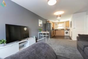 a living room with a large flat screen tv at Mulberry Wynd TSAC in Stockton-on-Tees