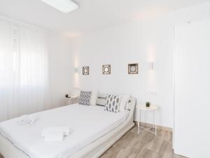 A bed or beds in a room at Preciosa Casa Terraza Privada 2hab 2baños AC