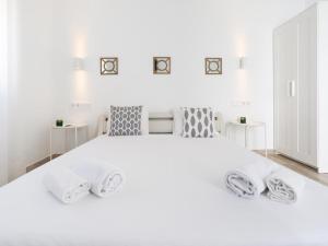 A bed or beds in a room at Preciosa Casa Terraza Privada 2hab 2baños AC