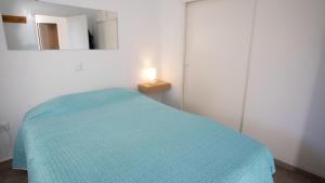 Postel nebo postele na pokoji v ubytování Apartamento con terraza y piscina - Todoholiday