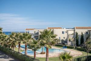 Πισίνα στο ή κοντά στο Calmaliving Seaside apartments with pool