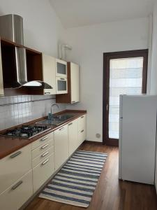 Kuchyň nebo kuchyňský kout v ubytování Casa dei Tempesta