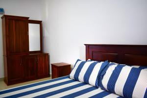 Uma cama ou camas num quarto em Catamaran6 Guest Inn