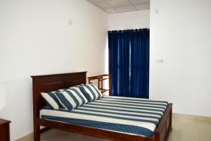 Кровать или кровати в номере Catamaran6 Guest Inn