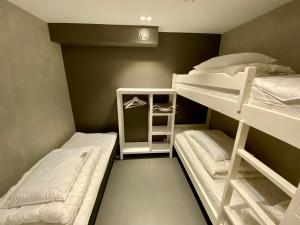 two bunk beds in a small room with at Ski Lodge Gautefall in Gautefall