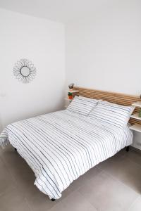 Tempat tidur dalam kamar di A CASA DI FIBI