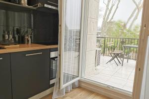 Балкон или терраса в Appart Hotel Spa Perpignan